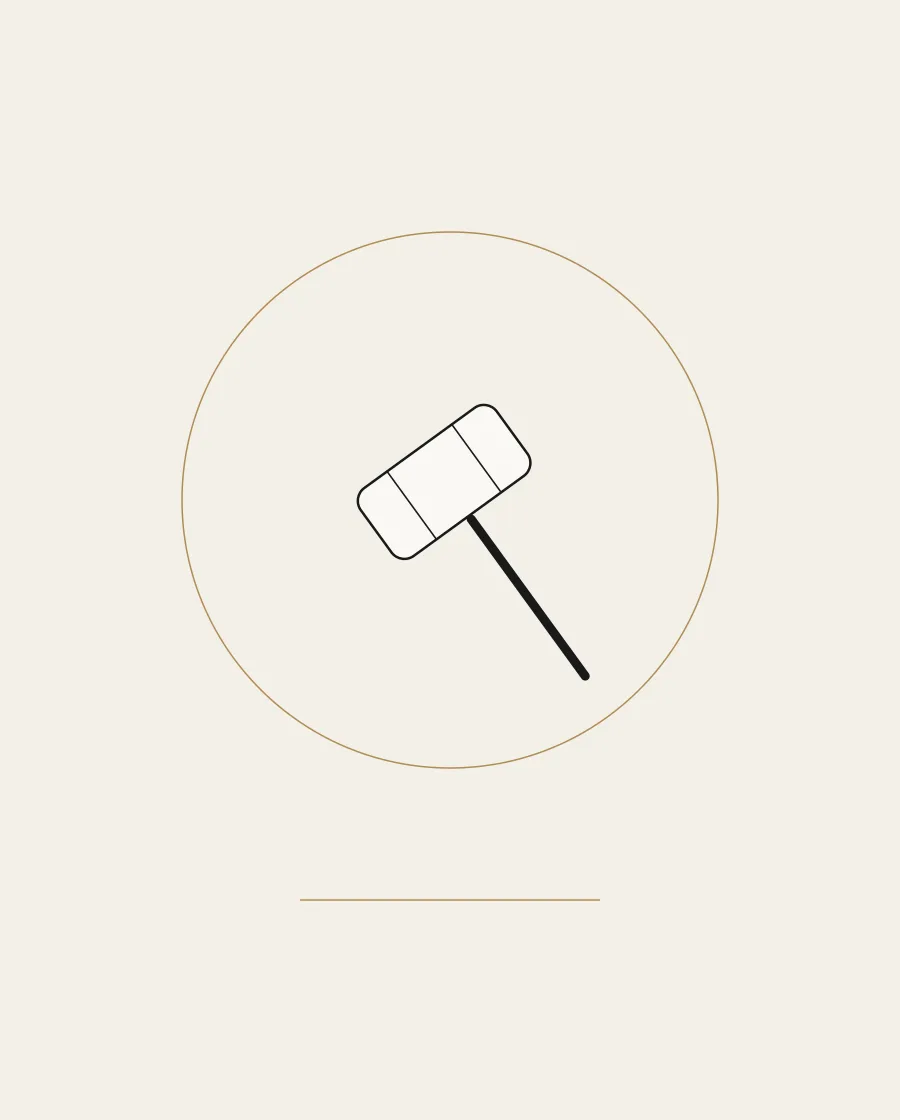 Line drawing of an auction gavel inside a gold ring.